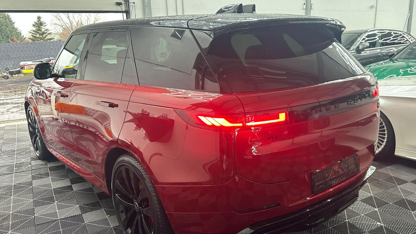 Rear three-quarter view of Range Rover Sport rental in Marbella showcasing premium SUV styling