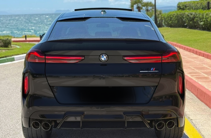Rear view of BMW X6M high-performance rental vehicle in Marbella