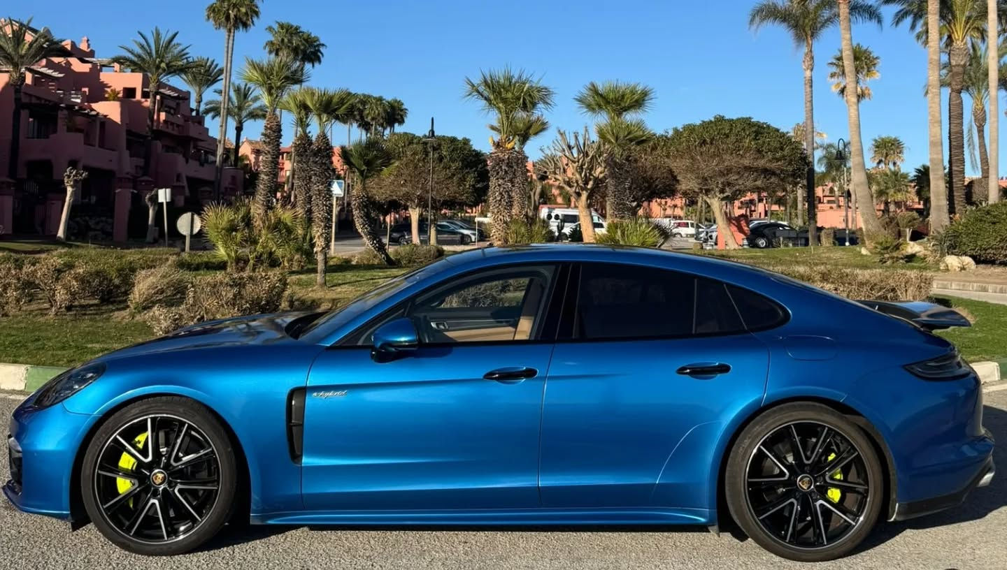 Side profile of Porsche Panamera 4 luxury sports sedan in Marbella