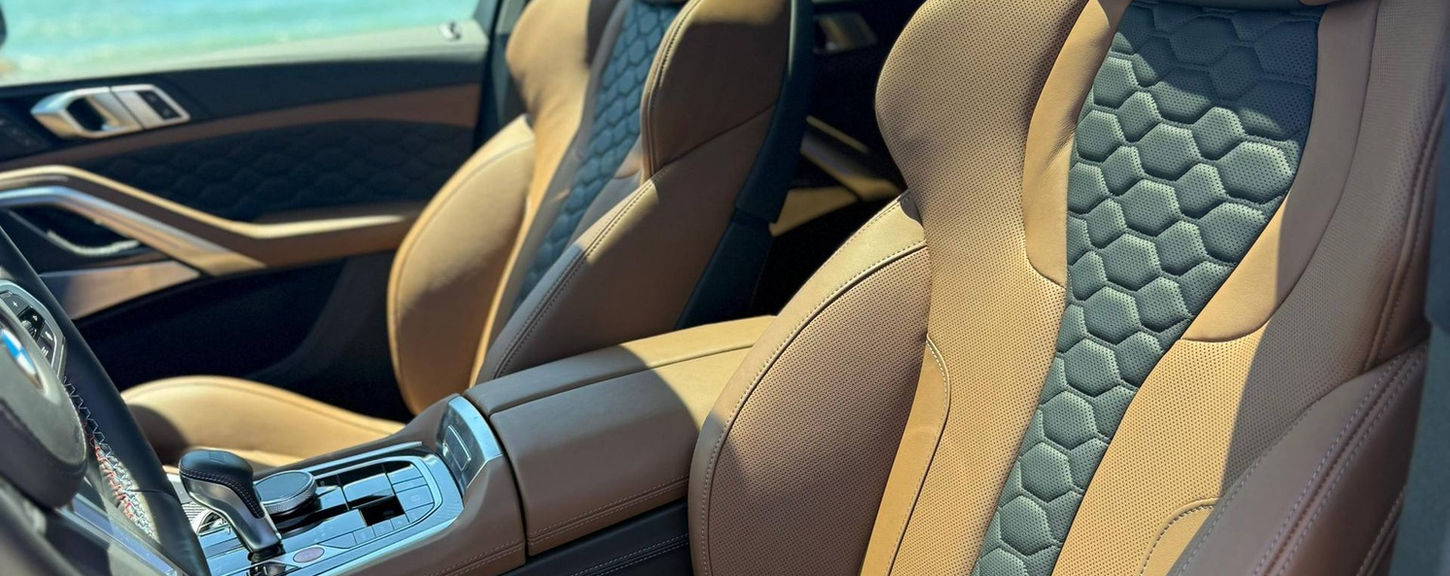 Front sport seats inside BMW X6M available for rent in Marbella