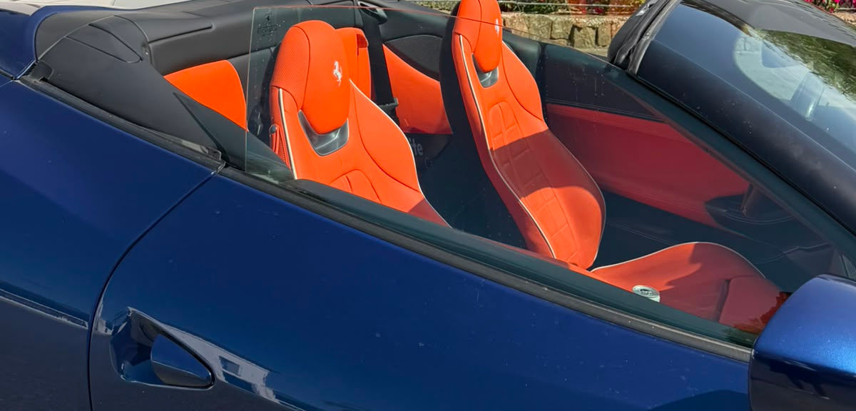 Ferrari Portofino convertible with red leather seats photographed in Marbella.