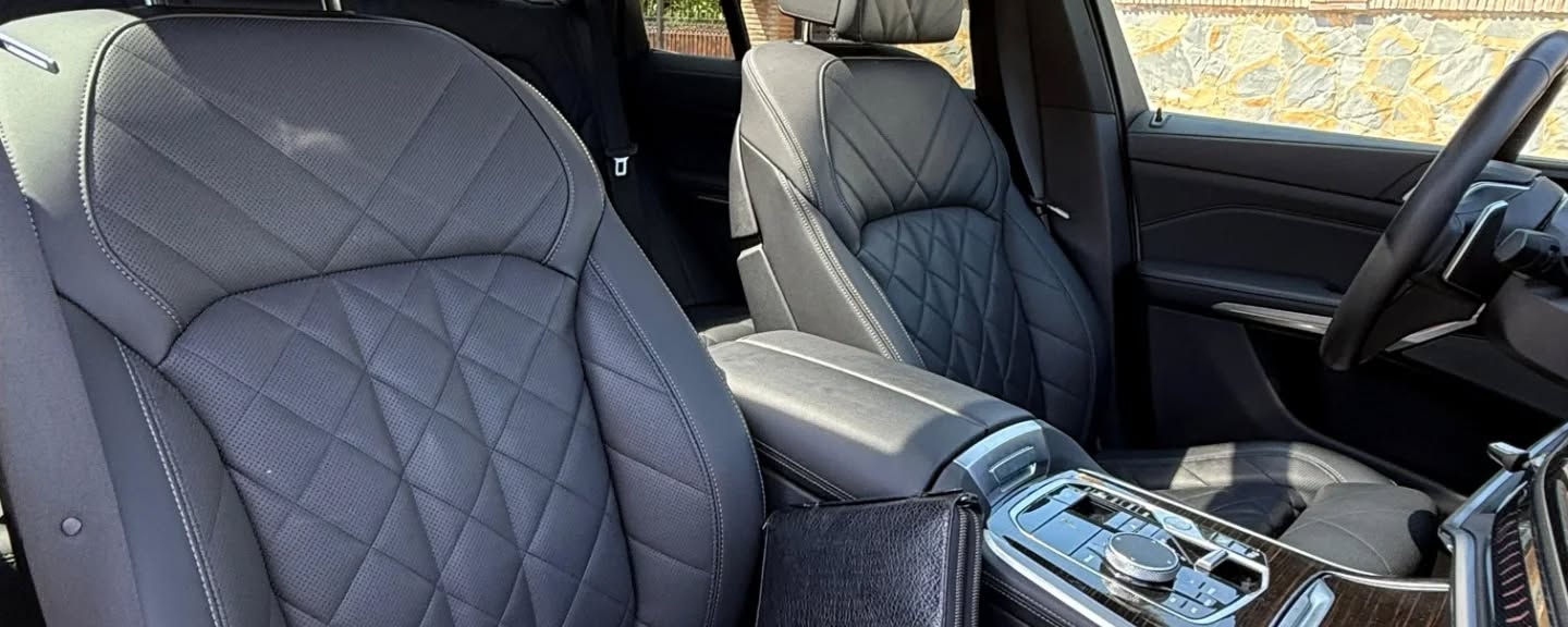 Front seats inside BMW X5 luxury SUV available for hire in Marbella