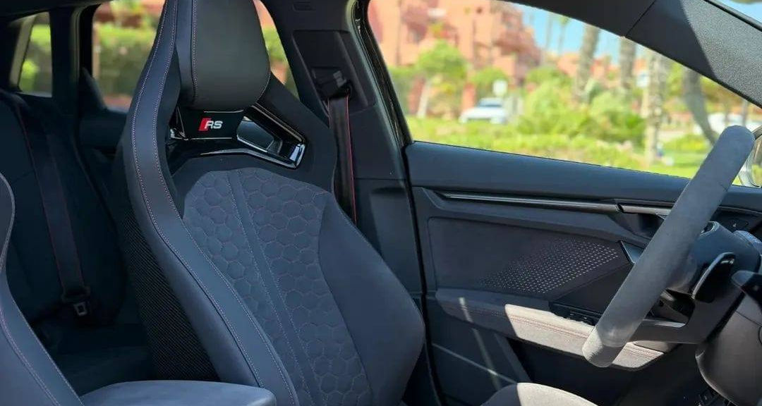 Front sport seats inside Audi RS3 available for rent in Marbella