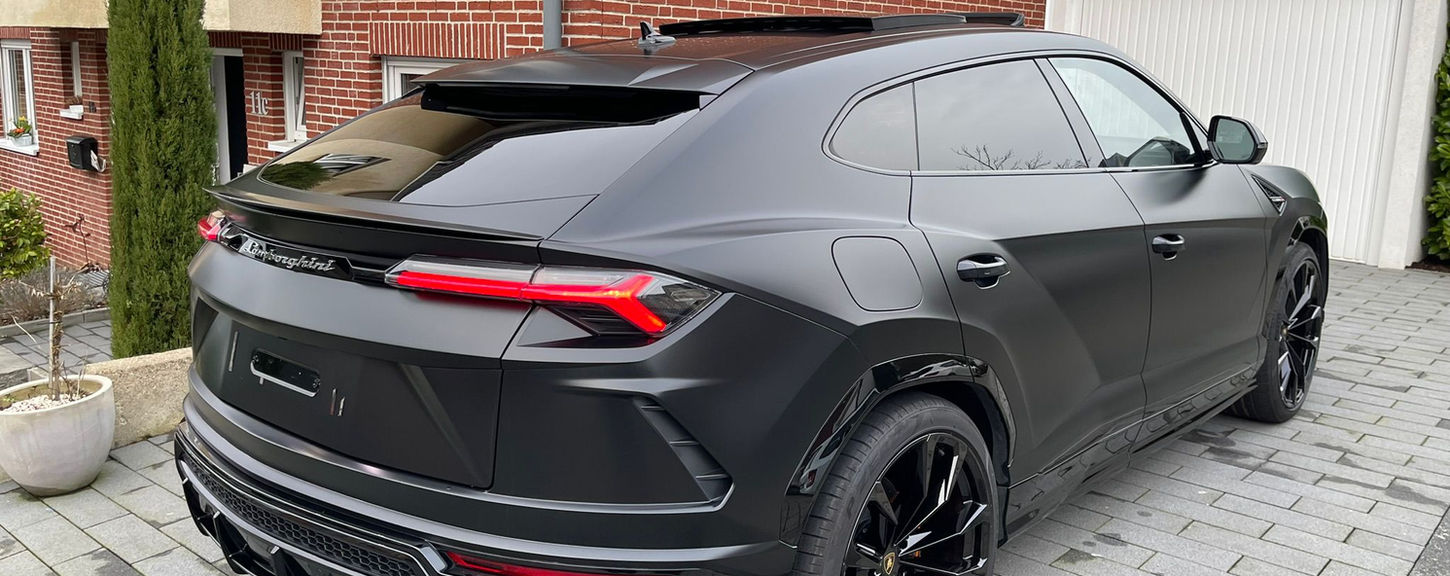 Rear three-quarter view of the Lamborghini Urus rental in Marbella