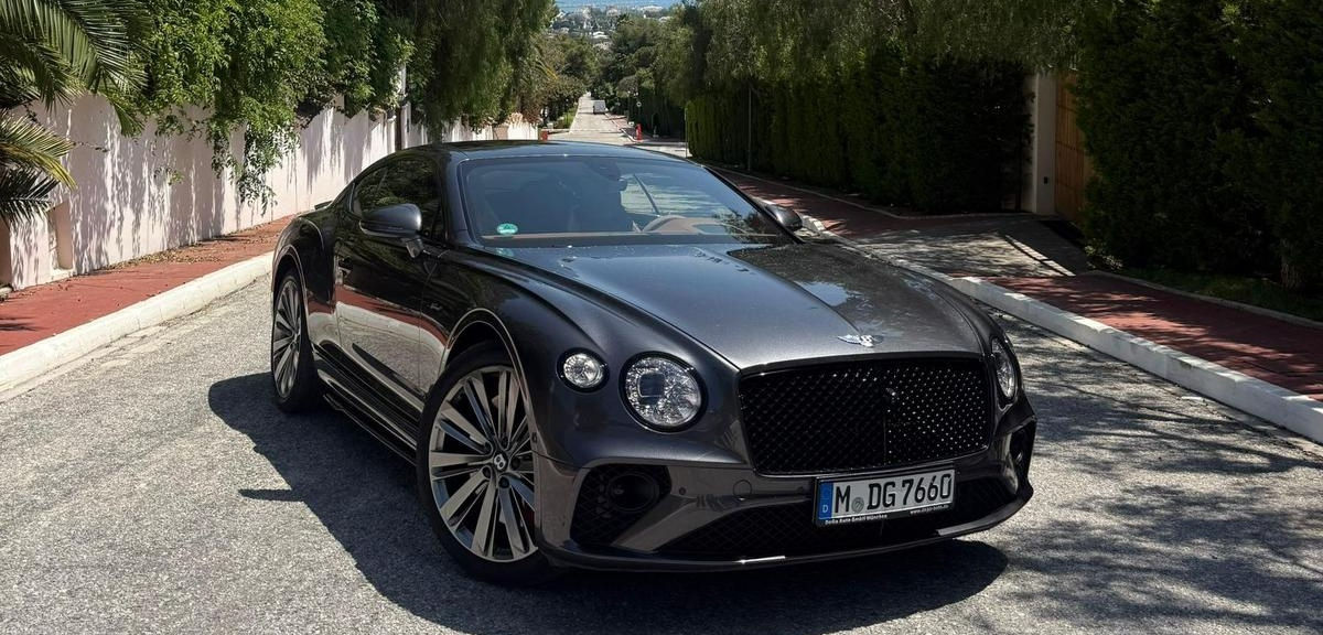 Bentley Continental GT Speed available for luxury car rental in Marbella photographed from the front three-quarter angle