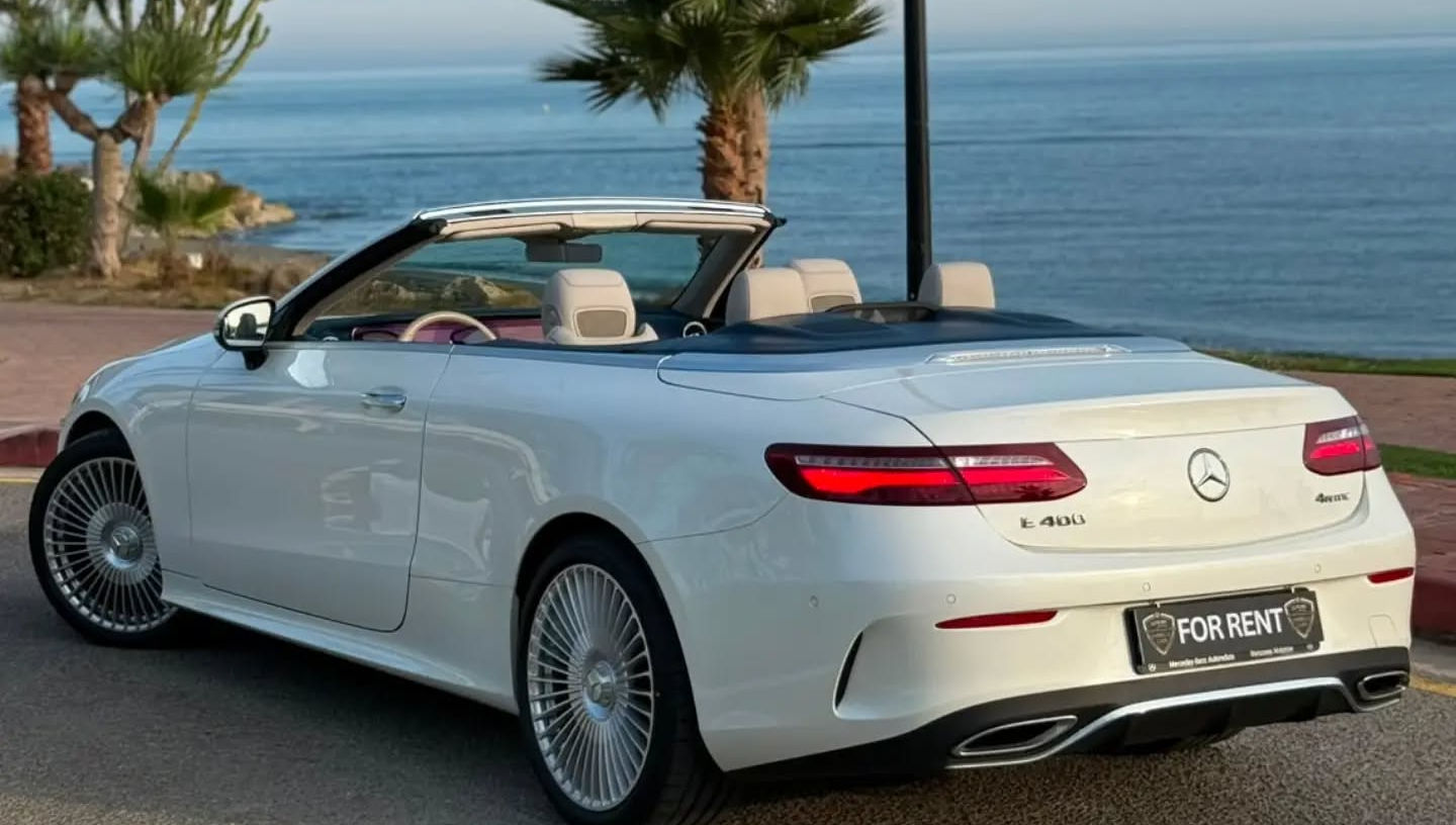 Rear three-quarter view of the Mercedes E400 4MATIC Cabriolet rental in Marbella