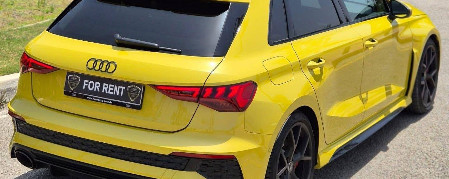 Rear angle of Audi RS3 sports sedan available for rent in Marbella
