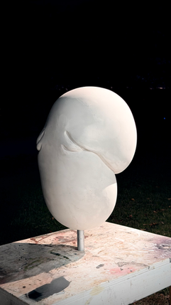 abstract symbolic head vessel sculpture in progress by Ralph Paquin with smooth white surfaces and organic contours from the Ethereal Origins series.