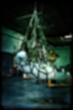 contemporary abstract sculpture in progress hanging from the ceiling of Ralph Paquin's art studio