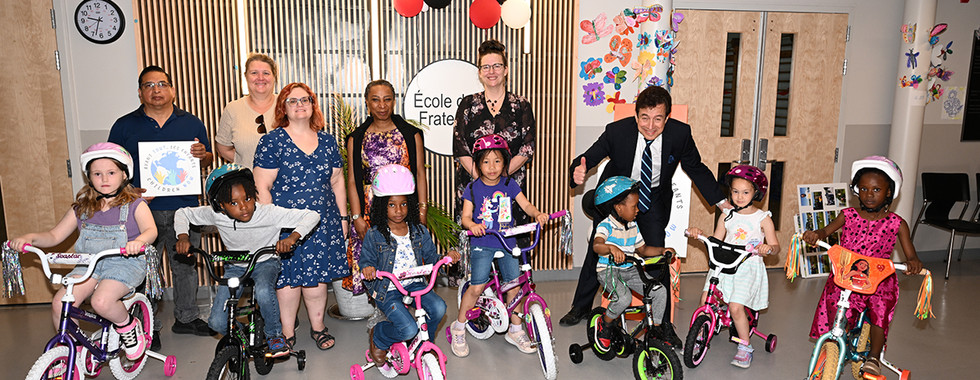7 children from École de la Fraternité receive 7 brand-new bikes