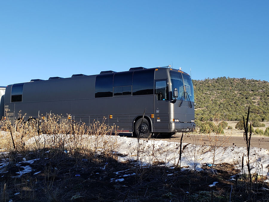 Prairie Entertainer coach and driver on the road