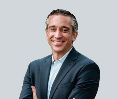 Smiling headshot of financial advisor Chris Wells