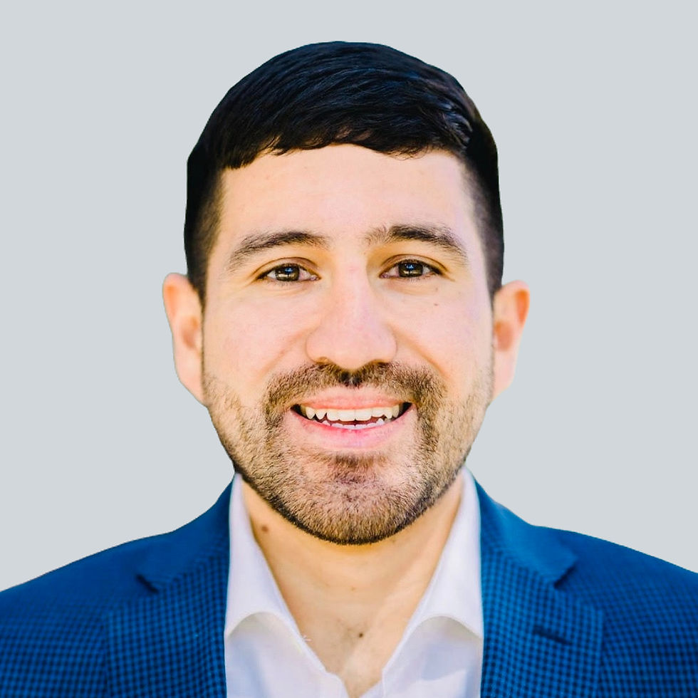 Smiling headshot of financial advisor Phil Flores