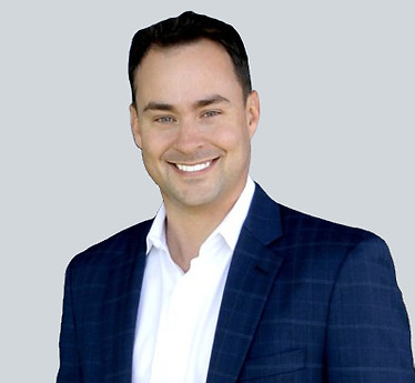Smiling Jeff Davidson in blue suit