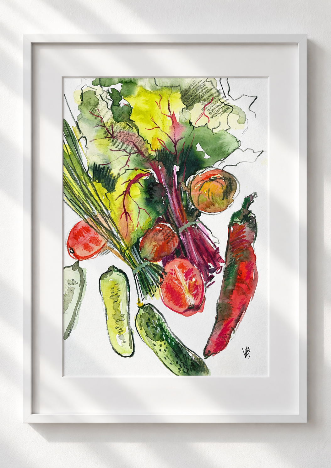 Vegetable watercolor in a white frame and mount on a white wall, with soft diagonal sunlight across the frame and artwork.