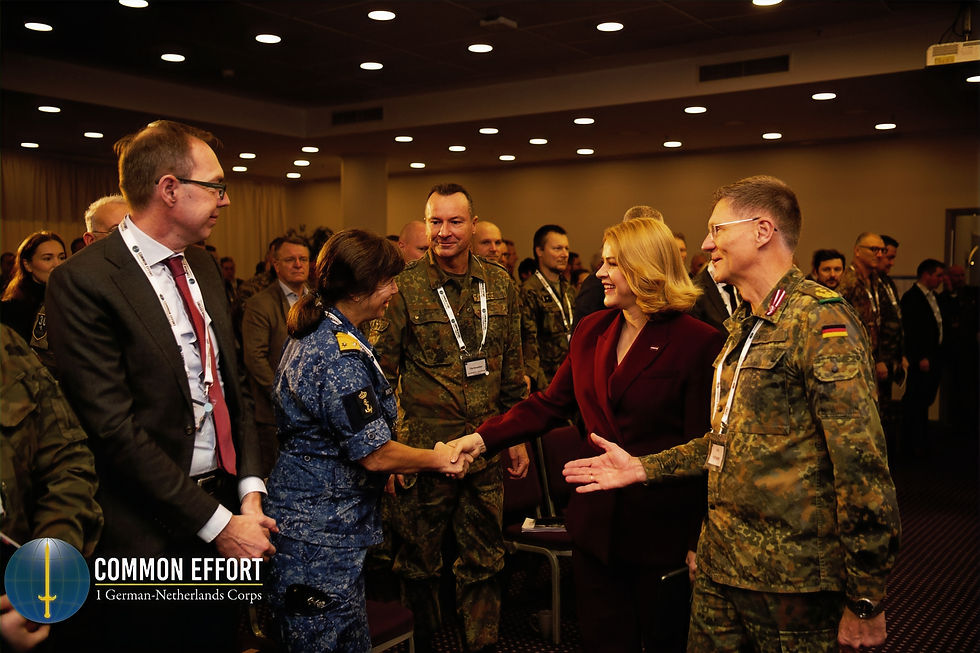 Commander 1GNC Peter Mirrow and Prime minister Evika Siliņa shaking hands with Rear Admiral Morang