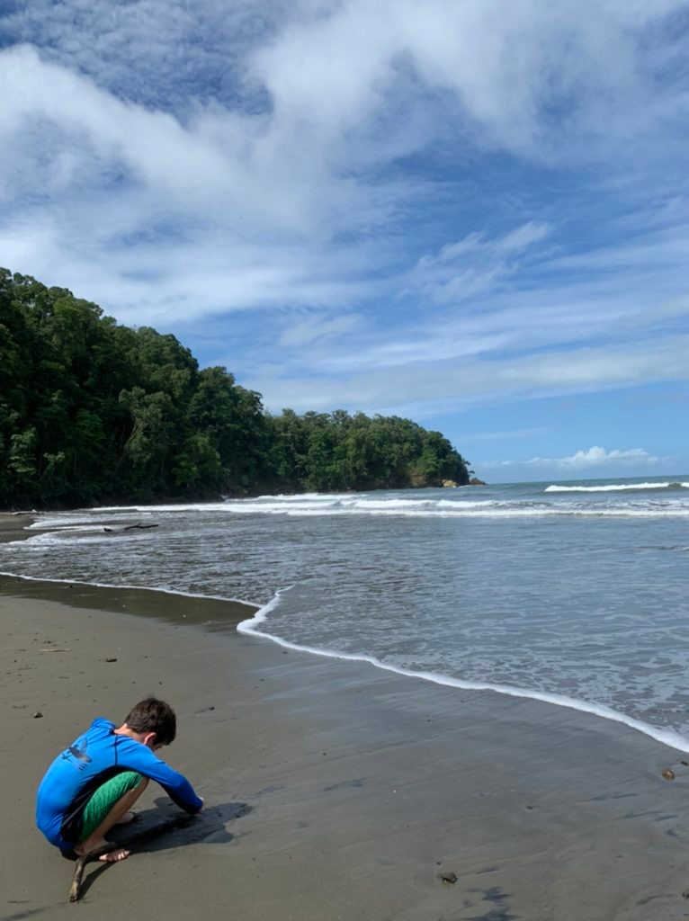 Boy on beach in Costa rica