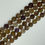 Thumbnail: Close-up of 12mm natural African ametrine beads with goethite inclusions, showcasing rich purple and golden hues.