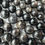 Thumbnail: Detailed view of Gold Sheen Sapphire round beads, perfect for adding a touch of luxury to your jewelry