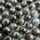 Thumbnail: Merlinite Polished Round Beads