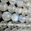 Thumbnail: Detailed view of Moonstone AAAA polished round beads, perfect for jewelry making