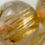 Thumbnail: Golden Rutilated Quartz AAA Polished 8mm Round Beads