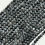 Thumbnail: Merlinite Polished Round Beads