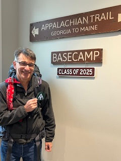 He is holding his hang tag.