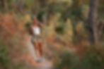 happy-woman-using-mobile-phone-while-hiking-in-nat-2023-11-27-05-30-07-utc.jpg