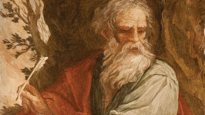 Elderly man with long beard holds a feather quill, wearing red and green robes. Brown, rustic background with tree branches. Reflective mood.