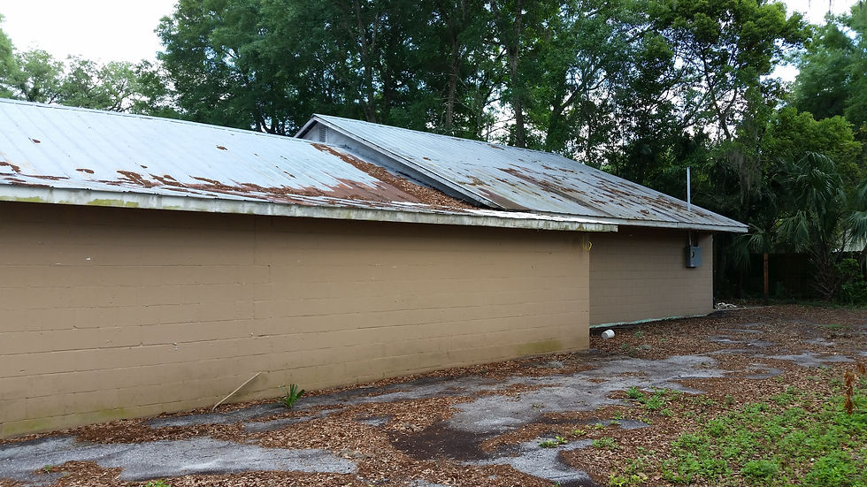 Side of building with parking lot