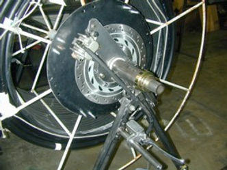 Shipping Reel Breaking System to add tension to the liner during eversion