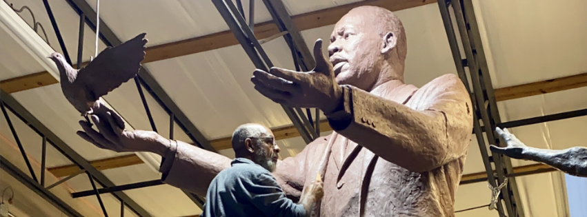 Basil Watson working on "Hope Moving Forward"