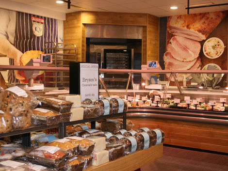 Cranstons traditional butchers shop with butchery counters and cake stands
