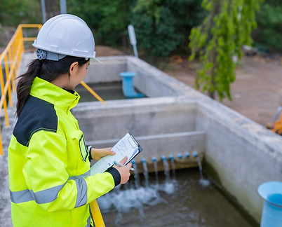 Environmental engineers work at wastewater treatment plants,Water supply engineering worki