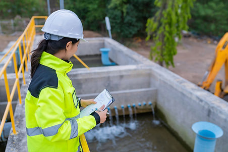 Environmental engineers work at wastewater treatment plants,Water supply engineering worki