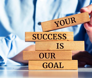 Wooden blocks with words 'Your success is our goal'. Business concept.jpg