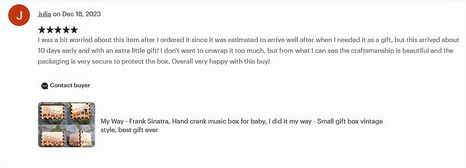 Etsy review screenshot showing customer delight with unique handmade wooden music box.