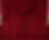 Dramatic red theater curtain backdrop with large gold tassels on the side.