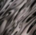 A dramatic liquid-like abstract texture with high contrast metallic black and silver ripples.