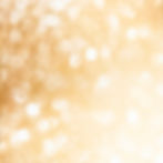 A soft, shimmering background with glittering gold bokeh lights.