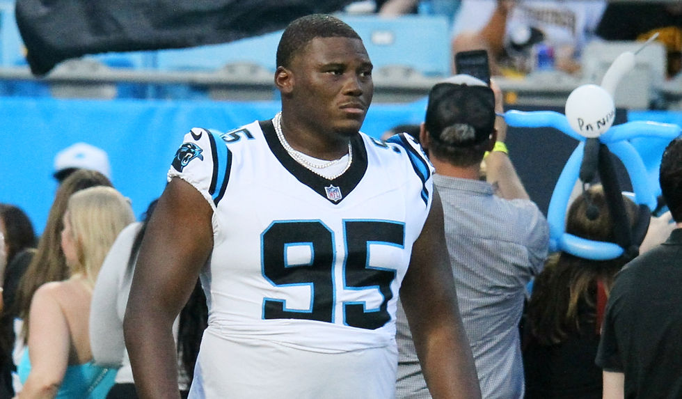 Panthers' Derrick Brown walks out to field during preseason game against Pittsburgh. Photo by: Kevin Tolbert