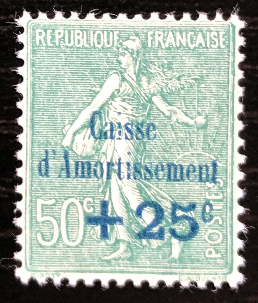 N° 247 'i" de "Caisse" doublement brisé
