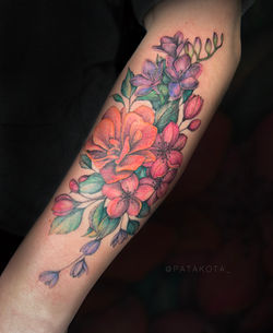 Color flora tattoo