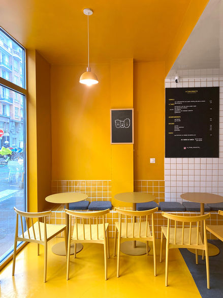 Design intérieur restaurant La Team Croquette à Lille par Andrée Bracq Studio béton jaune