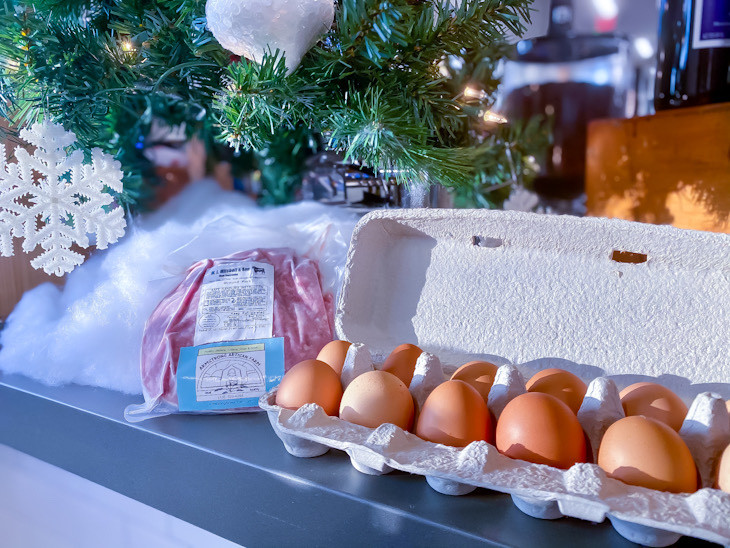 Armstrong artisan farms winston salem north carolina, eggs and ground sausage under Christmas tree.