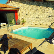 piscine-bois-octogonale-allongee-difloisirs-33-C2D3510E.jpeg