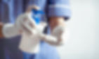 doctor-white-gloves-uses-hand-sanitizer-