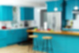 Modern kitchen with teal blue cabinetry