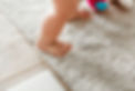 closeup-baby-s-legs-while-standing.jpg